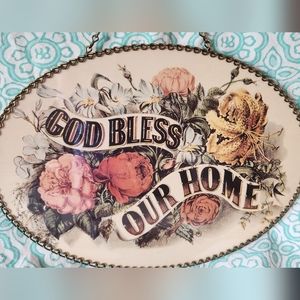 God bless our home sign. Thin glass with metal detail around sign and hanger.